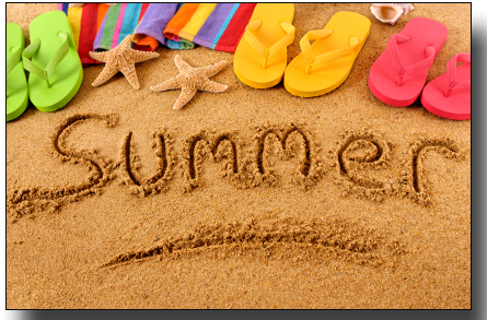 The word summer written in sand